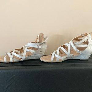 Women’s shoe sandal with zip up back and side buckles. Size 8. Like new.